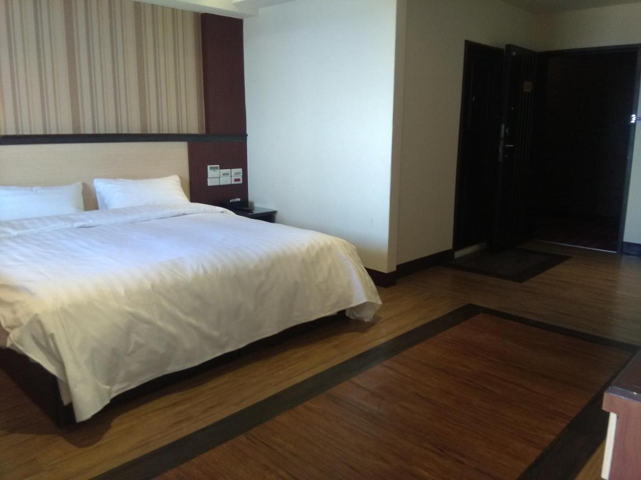 Dengfeng Milan Business Hotel Huwei Esterno foto